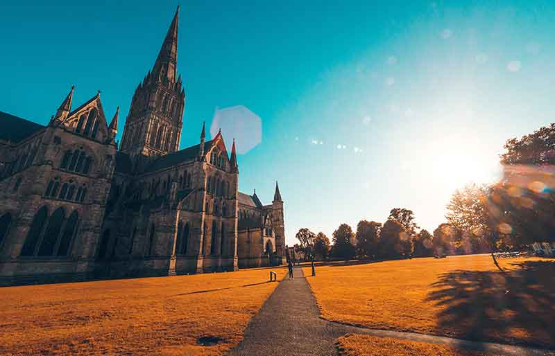 Exterior view of the Gothic architecture with clear blue skies.